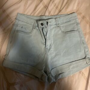 Light blue jeans cuffed bottom